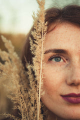 Woman who uses natural sesame seed oil for skincare